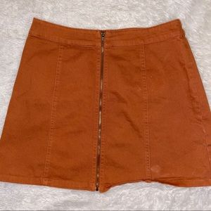 Burnt orange zip up mini skirt